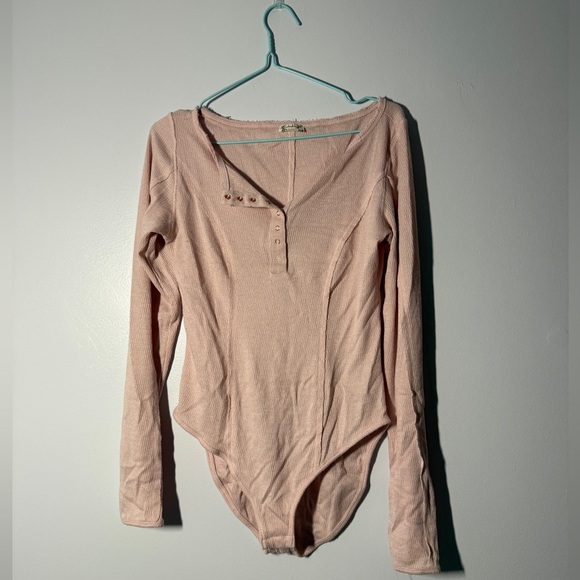 Free People Tops - Intimately Free People Baby Pink Long Sleeve Bodysuit Size Small